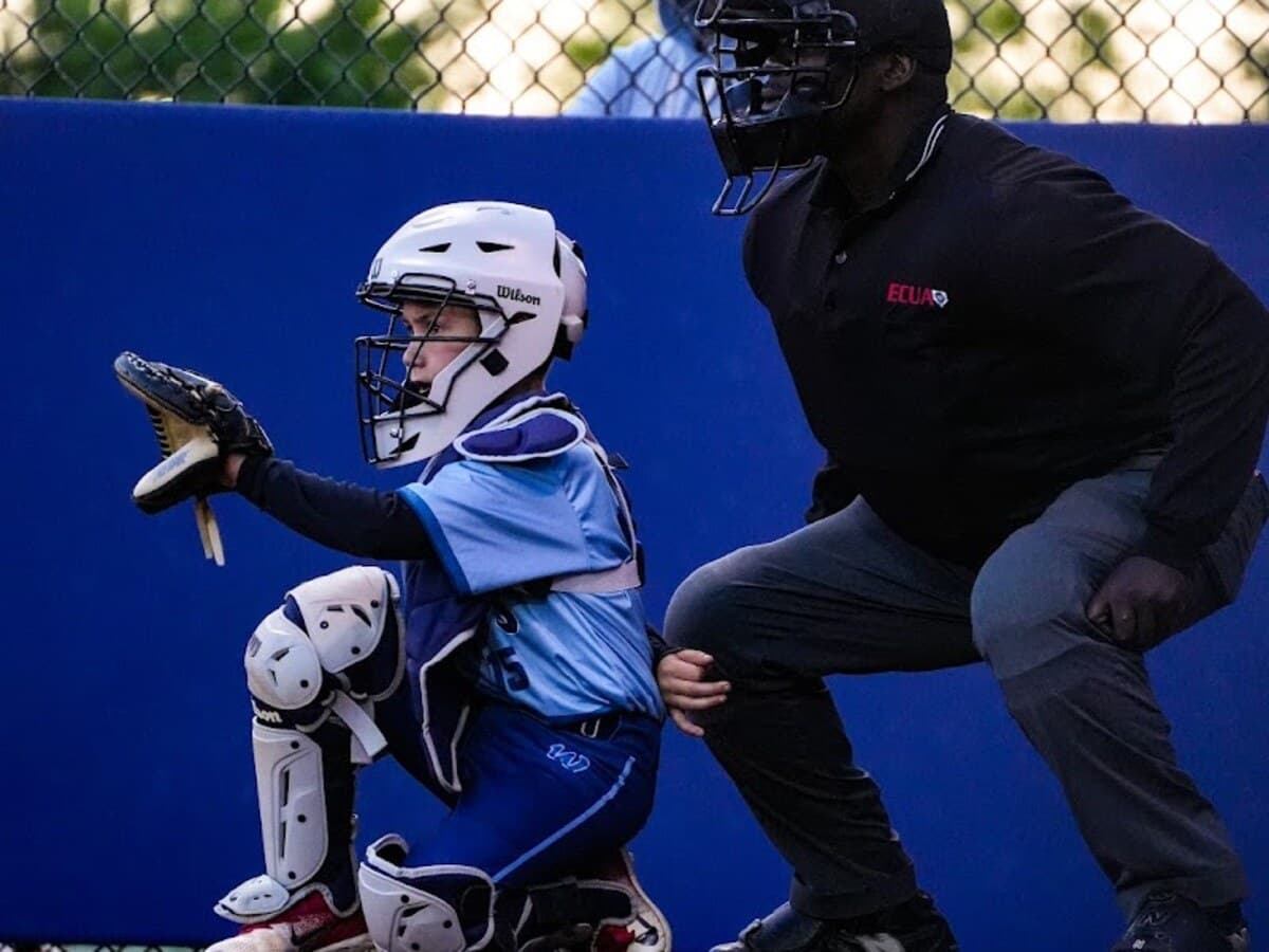 Waves catcher receiving the baseball behind the plate
